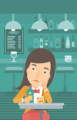 Image showing Sad woman with bottle and glass.