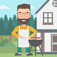 Image showing Man preparing barbecue.