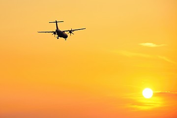 Image showing Airplane at the sunset 