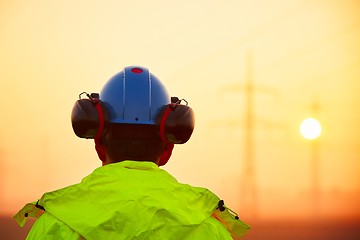 Image showing Worker at the sunrise