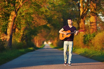 Image showing Guy with guitar