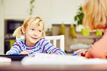 Image showing Siblings are doing homework 