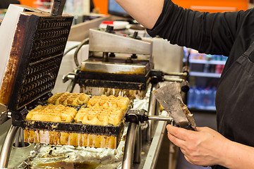 Image showing Preparing homemade Belgian waffles.