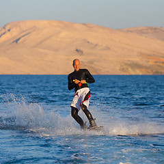 Image showing Wakeboarder in sunset.