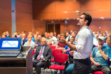 Image showing Public speaker giving talk at Business Event.