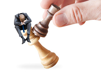 Image showing Businessman on a chess piece