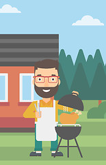 Image showing Man preparing barbecue.