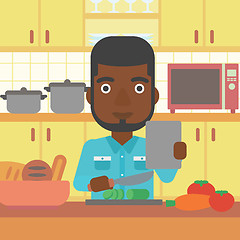 Image showing Man cooking meal.