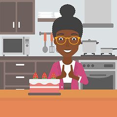 Image showing Woman looking at cake.