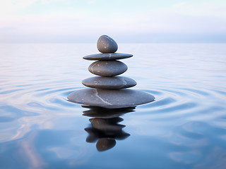 Image showing Balanced Zen stones in water 