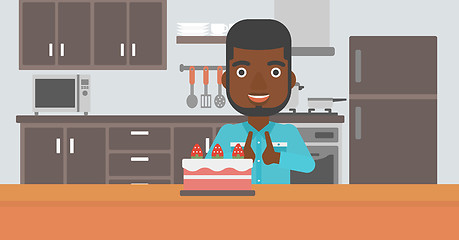 Image showing Man looking at cake.