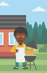 Image showing Man preparing barbecue.