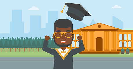 Image showing Graduate throwing up his hat.