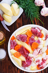 Image showing raw meat with vegetables