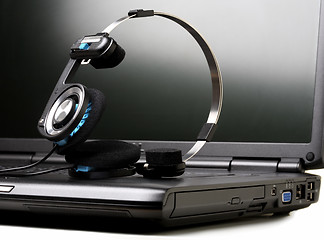 Image showing Laptop and headphones