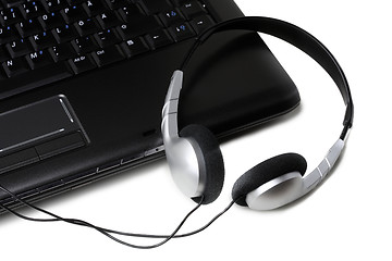 Image showing Laptop and headphones