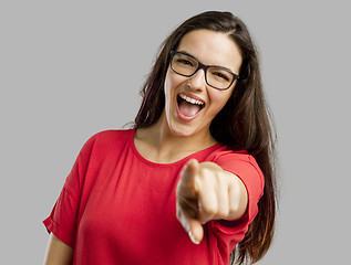 Image showing Happy woman pointing to the camera