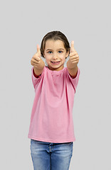 Image showing Happy girl with thumbs up