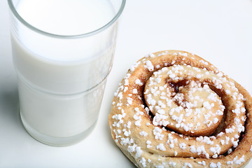 Image showing Bun and Glass of Milk