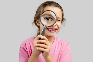 Image showing Looking through a magnifying glass