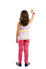 Image showing Girl writing on a glass wall