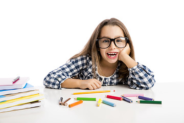 Image showing Little girl making drawings