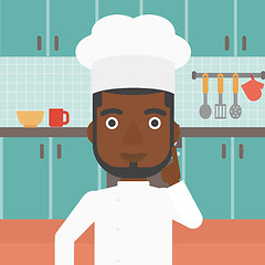 Image showing Chef pointing forefinger up.