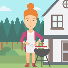 Image showing Woman preparing barbecue.