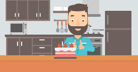 Image showing Man looking at cake.