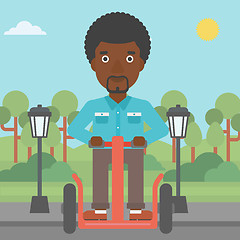 Image showing Man riding on electric scooter.