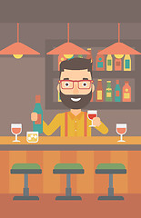 Image showing Bartender standing at the bar counter.