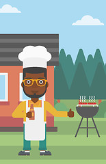 Image showing Man preparing barbecue.