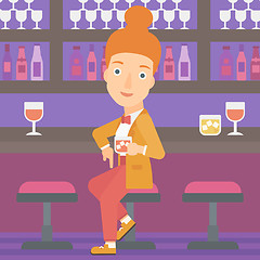 Image showing Woman sitting at bar.