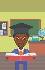 Image showing Man in graduation cap holding book.