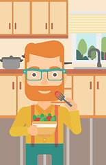 Image showing Man eating salad.