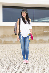 Image showing Student with a skateboard