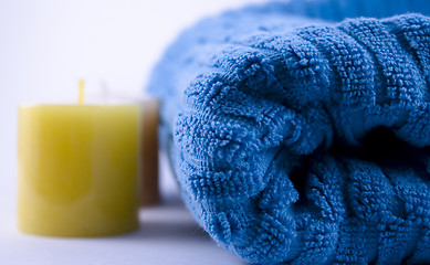 Image showing Blue towel and candles