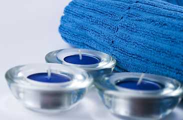 Image showing blue towel and candles