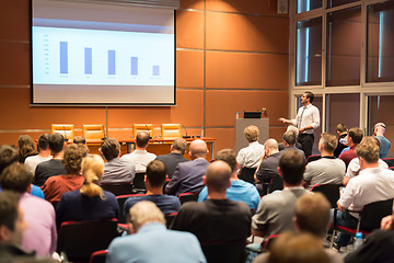 Image showing Business speaker giving a talk in conference hall.