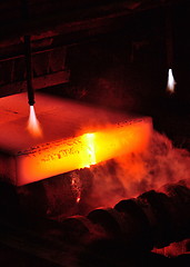 Image showing Gas cutting of the hot metal in a plant