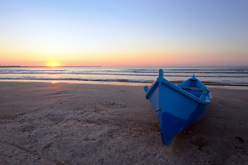 Image showing Blue boat on beach