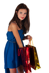 Image showing Attractive woman with freckles holding bags