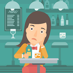 Image showing Sad woman with bottle and glass.