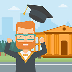 Image showing Graduate throwing up his hat.