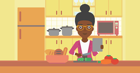 Image showing Woman cooking meal.