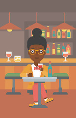 Image showing Woman sitting at bar.