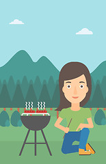 Image showing Woman preparing barbecue.