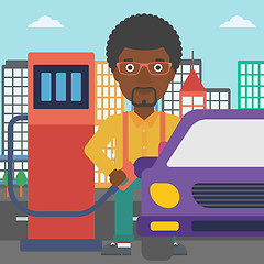 Image showing Man filling up fuel into car.