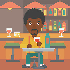 Image showing Man sitting at bar.