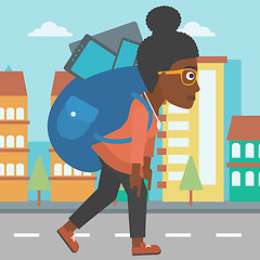 Image showing Woman with backpack full of devices.